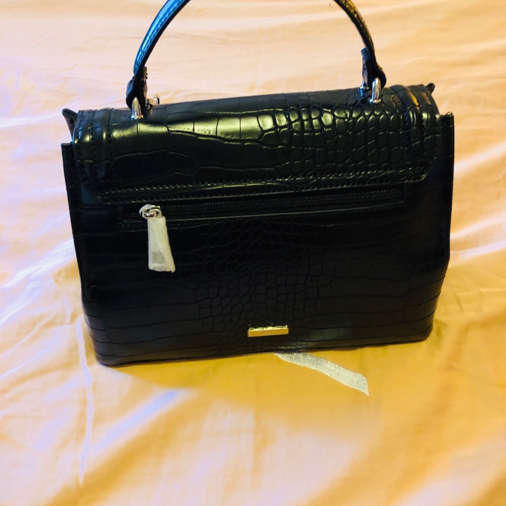 Carter’s aldo negra